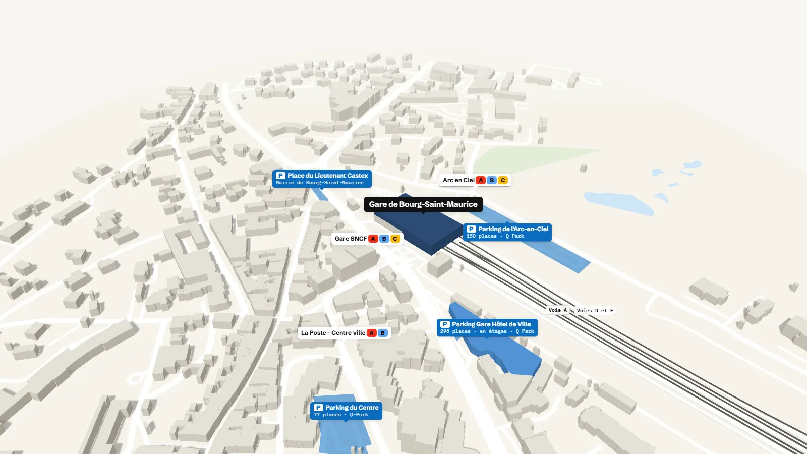 Plan 3D des accès de la gare de Bourg-Saint-Maurice : bâtiment voyageurs, quais numérotés, parkings, entrées, taxis, arrêts de bus et de tram